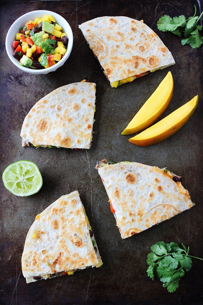 Mango Black Bean Quesadillas made with flour tortillas. A quick an easy meal kids and adults love! 