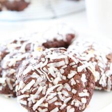 Vegan Chocolate Coconut Cookies with coconut on top served on a plate