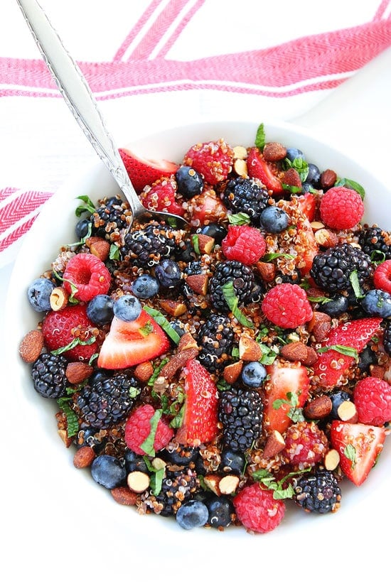 Berry Quinoa Salad in bowl with spoon.