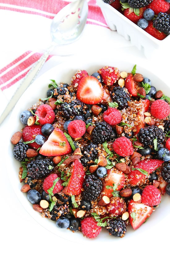 Berry Quinoa Salad in bowl with blackberries, raspberries, and blueberries.