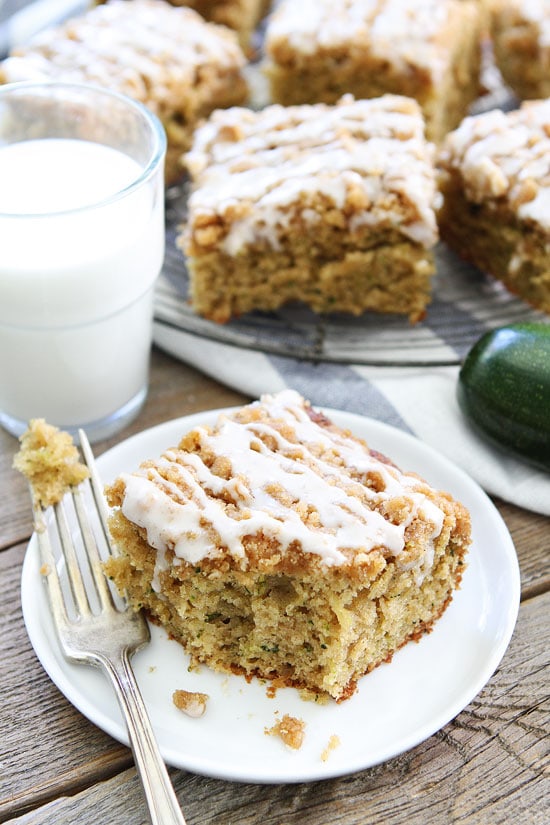 Brown Butter Zucchini Coffee Cake on plate with glass of milk 