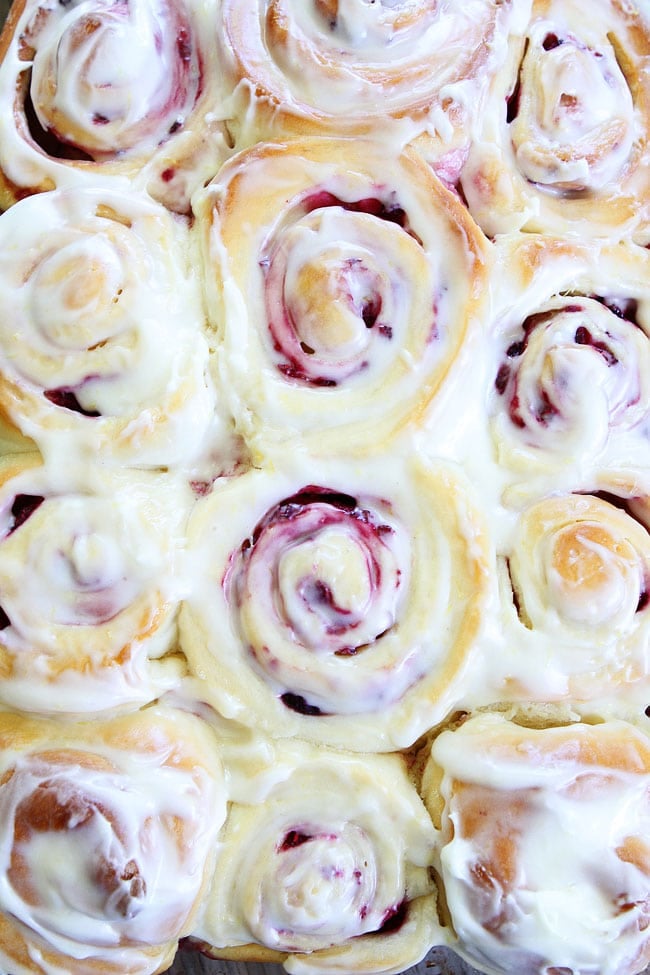 Raspberry Sweet Rolls with cream cheese frosting are a family favorite and perfect for holiday breakfasts