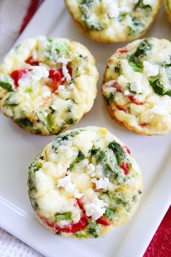 https://www.twopeasandtheirpod.com/wp-content/uploads/2015/08/Egg-Muffins-with-Kale-Roasted-Red-Pepper-and-Feta-3.jpg