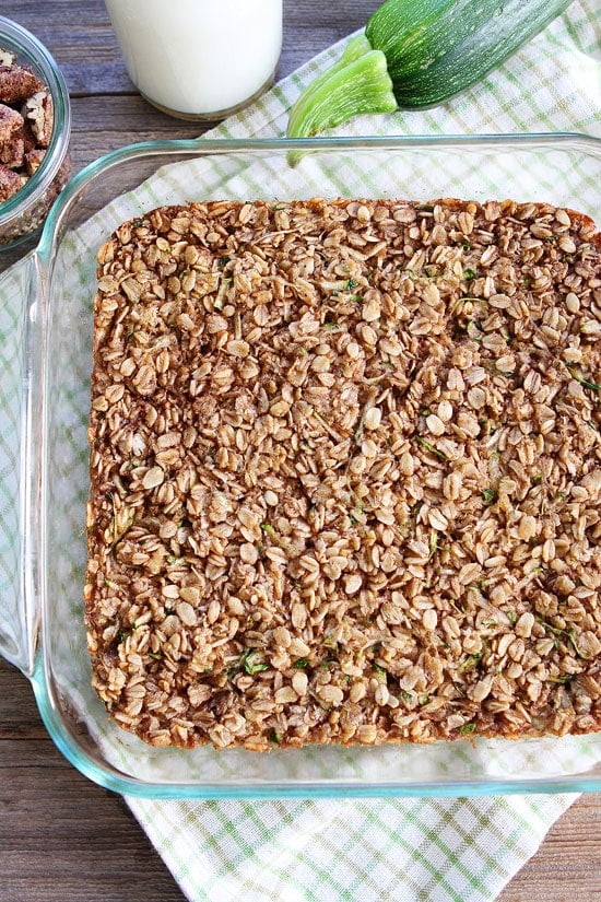 Zucchini Bread Baked Oatmeal Recipe on twopeasandtheirpod.com This easy and healthy baked oatmeal is a favorite at our house! Make a pan and reheat during the week for easy breakfasts! Zucchini Bread Baked Oatmeal in pan