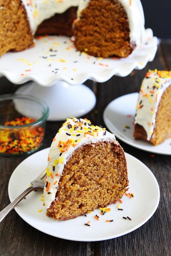 Pumpkin Bundt Cake with Cream Cheese Frosting Recipe on twopeasandtheirpod.com This easy pumpkin spice cake with cream cheese frosting is a fall favorite! It turns out perfect every time! Pumpkin Bundt Cake with Cream Cheese Frosting