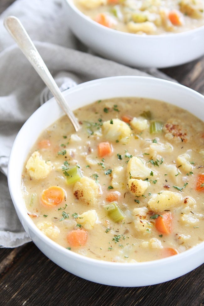 Creamy Roasted Cauliflower Chowder Recipe on twopeasandtheirpod.com This creamy and comforting chowder is SO good and it's good for you too! Creamy Roasted Cauliflower Chowder Recipe
