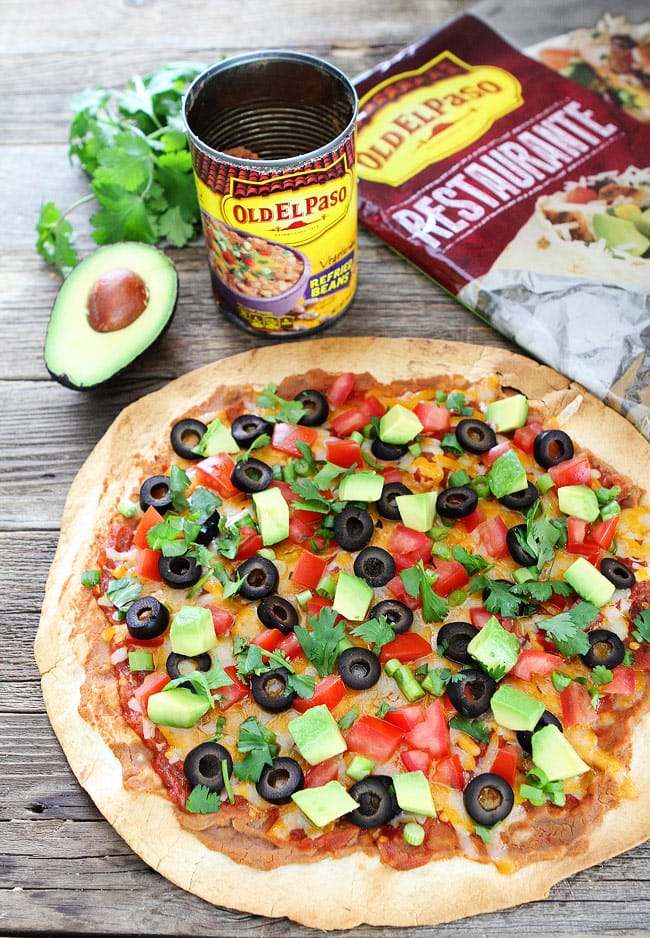 Mexican-Inspired Tortilla Pizza with Enchilada sauce and veggies