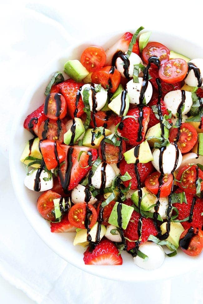 Avocado Caprese Salad with Strawberries in large bowl