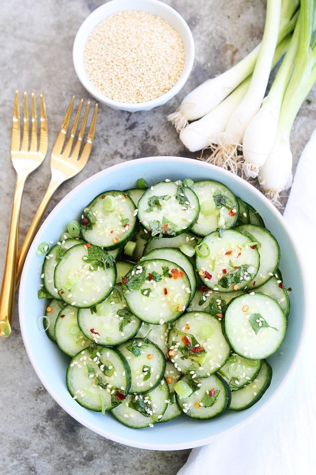 Cucumber Salad ready to serve with red pepper flakes and sesame seeds