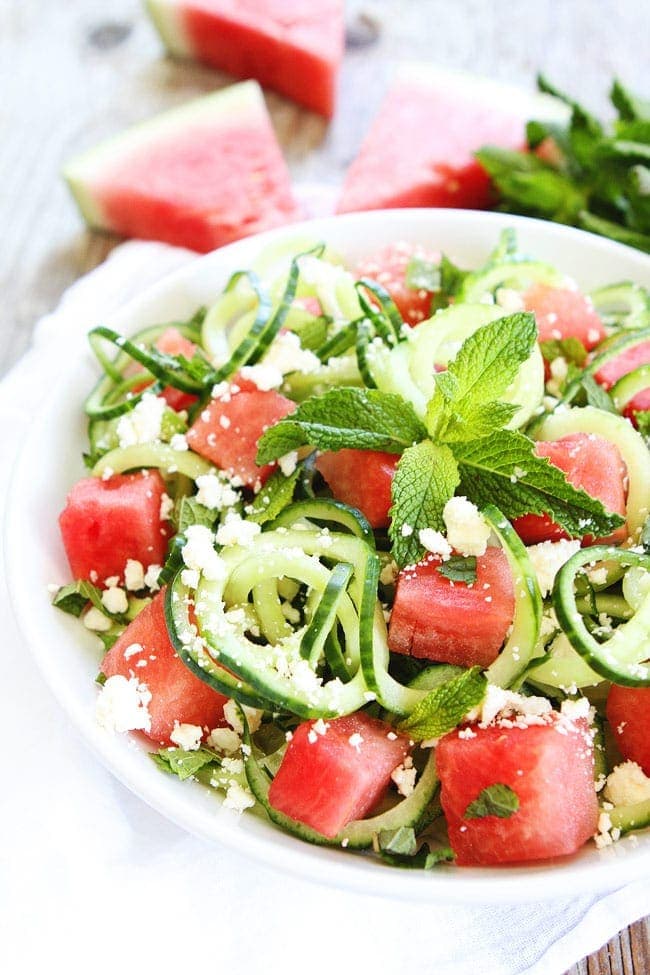 Cucumber Noodle, Watermelon, and Feta Salad Recipe on twopeasandtheirpod.com This cool and refreshing salad is easy to make and a great side for any summer meal. Cucumber Noodle, Watermelon, and Feta Salad Recipe