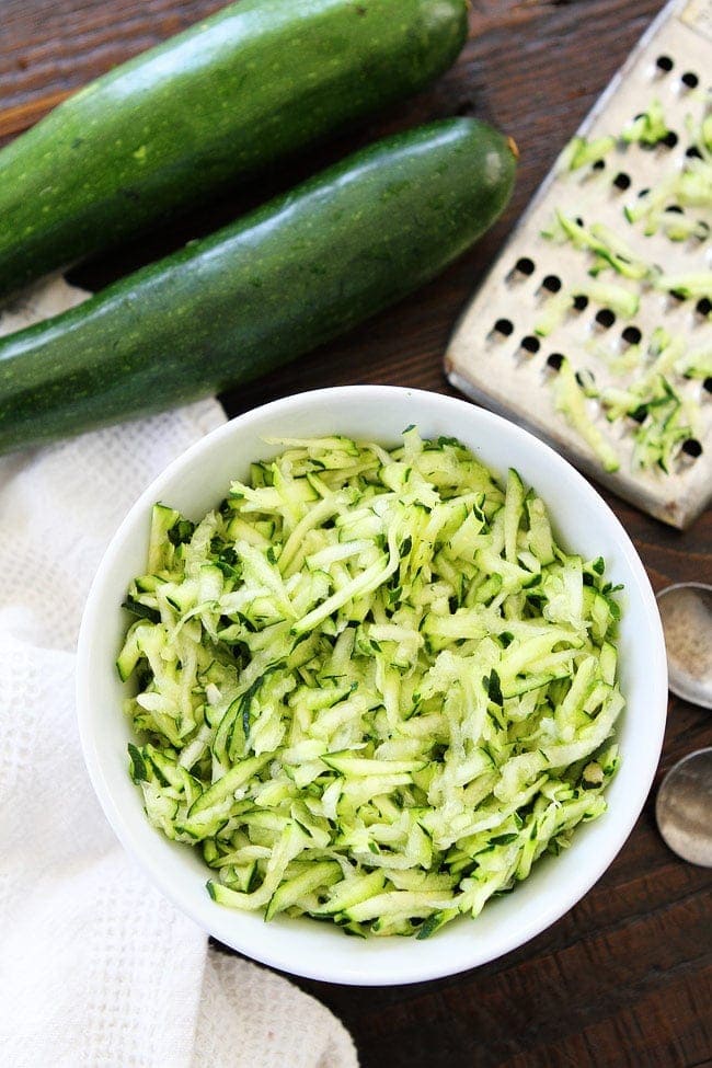 shredded zucchini in bowl.