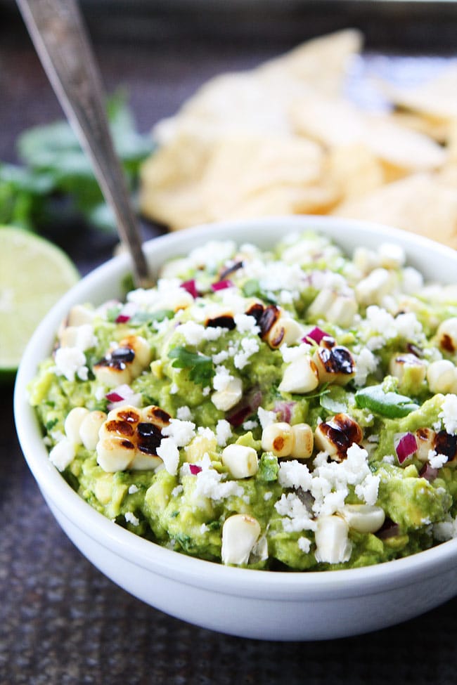 Grilled Corn Guacamole Recipe on twopeasandtheirpod.com The grilled sweet corn makes this guacamole extra special. It is great with chips or served with along side any Mexican meal! Grilled Corn Guacamole Recipe