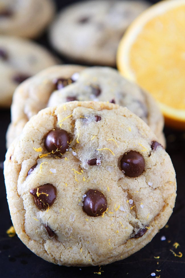 Orange Chocolate Chip Cookies Recipe on twopeasandtheirpod.com Soft and chewy chocolate chip cookies with a hint of orange! The chocolate and orange combo is AMAZING!