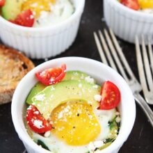 Baked eggs with Spinach and Avocado in ramekins