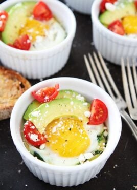 Baked eggs with Spinach and Avocado in ramekins