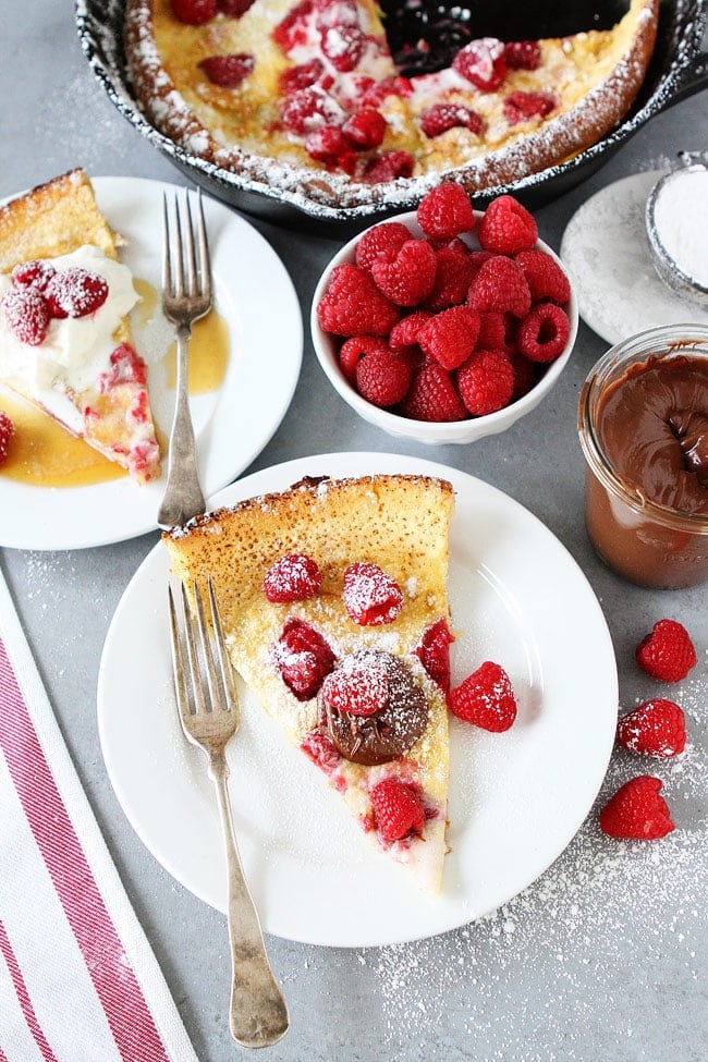 Dutch Baby Pancakes with raspberries and chocolate