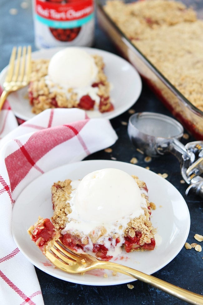 Cherry Oatmeal Bars Recipe on twopeasandtheirpod.com Tart cherries are spread between buttery oatmeal layers to create a delicious dessert. If you like cherry pie, you will LOVE these easy bars. Cherry Oatmeal Bars Recipe