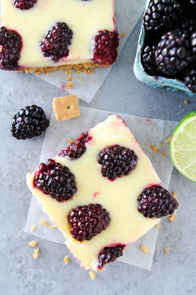 Blackberry Lime Squares Recipe with a creamy, lime filling, fresh blackberries, and an easy graham cracker crust.