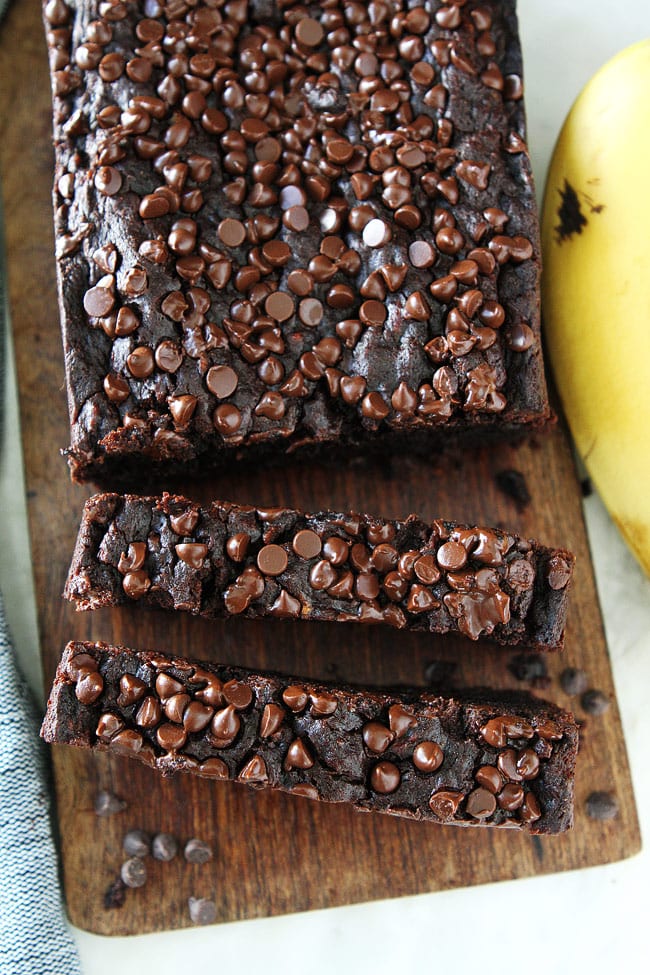 Gluten-Free Vegan Chocolate Banana Bread Recipe on twopeasandtheirpod.com You will never know this chocolate banana bread is gluten-free and vegan. It is SO rich, moist, and delicious! Everyone LOVES it! Chocolate Gluten Free Banana Bread with Vegan Chocolate Chips