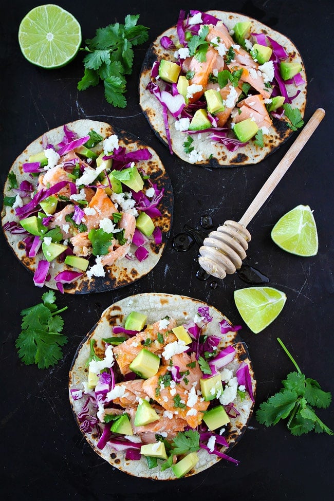 Salmon tacos with red cabbage avocado and cheese