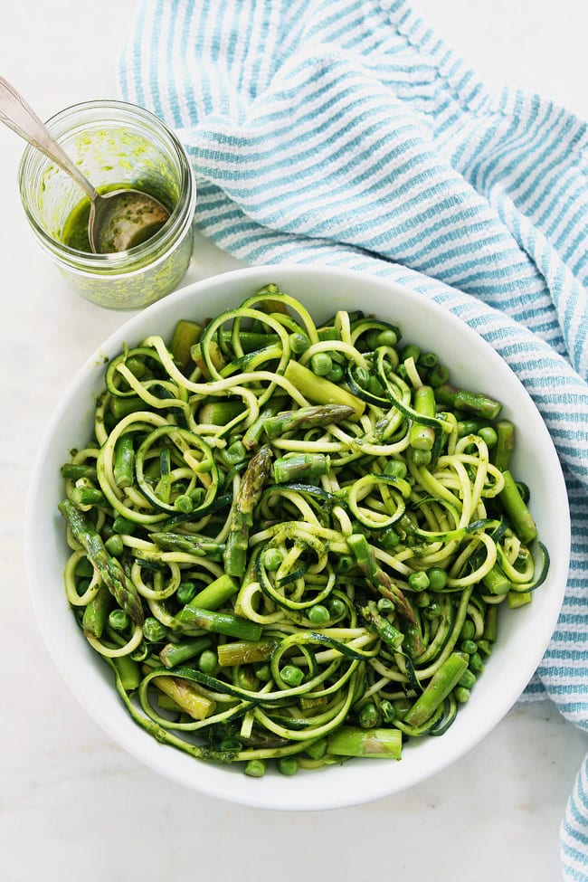 https://www.twopeasandtheirpod.com/wp-content/uploads/2017/03/Zucchini-Noodles-with-Asparagus-Peas-and-Basil-Vinaigrette-1.jpg