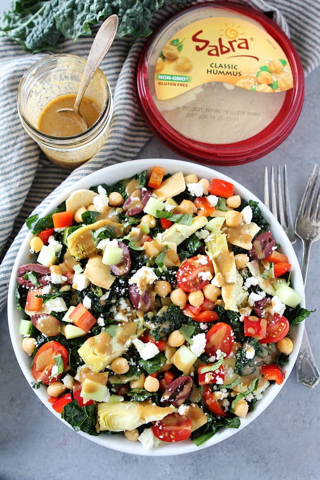 Mediterranean Kale Salad with a simple hummus balsamic dressing makes a great side dish or main dish.