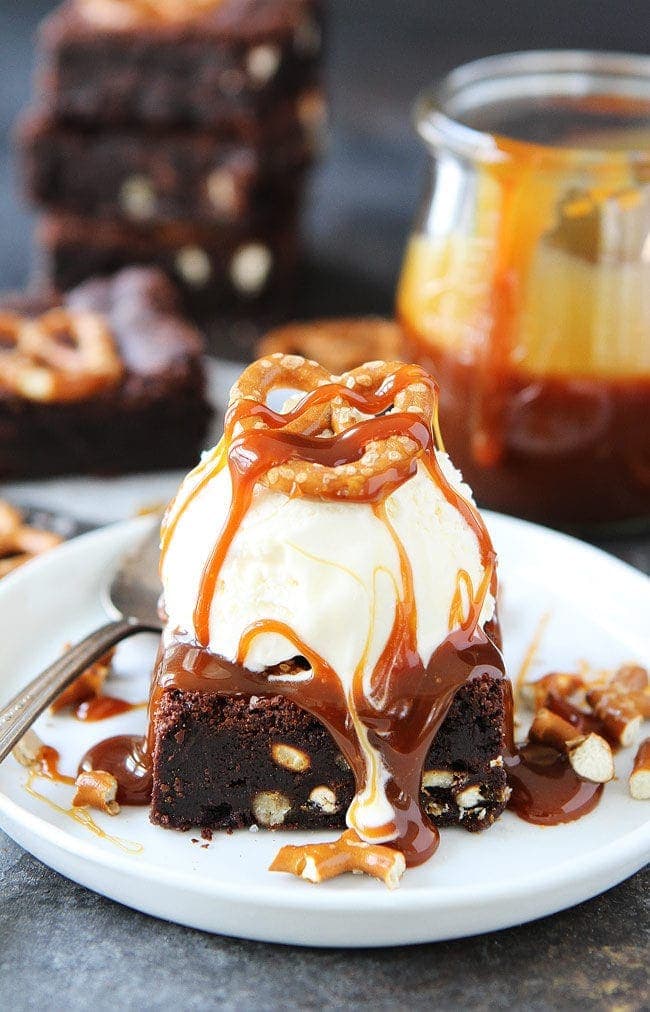 Salted Caramel Pretzel Brownies are fudgy, gooey brownies with pretzel pieces and a layer of salted caramel sauce. These brownies are the ultimate dessert. 