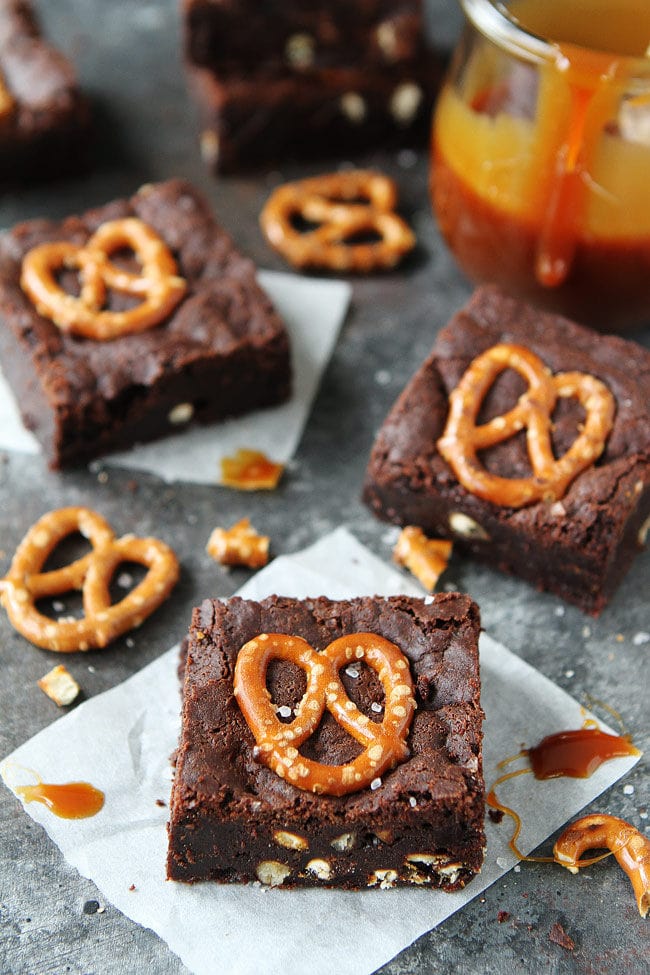 Salted Caramel Pretzel Brownies are fudgy, gooey brownies with pretzel pieces and a layer of salted caramel sauce. You will love these sweet and salty brownies.