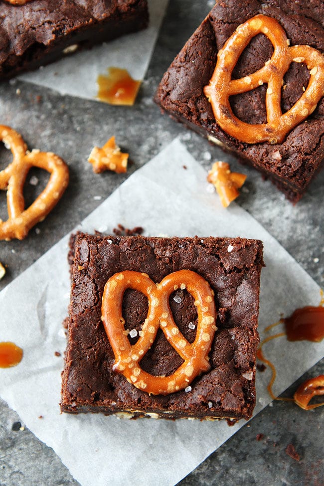 How to make the BEST Salted Caramel Pretzel Brownies. These brownies are fudgy, gooey with salty pretzels and caramel sauce.