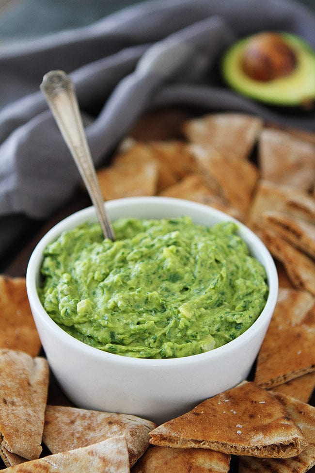 Avocado, Spinach, and Artichoke Dip is the perfect appetizer for parties or a great easy every day snack! It is great served with pita chips, crackers, or cut up vegetables.