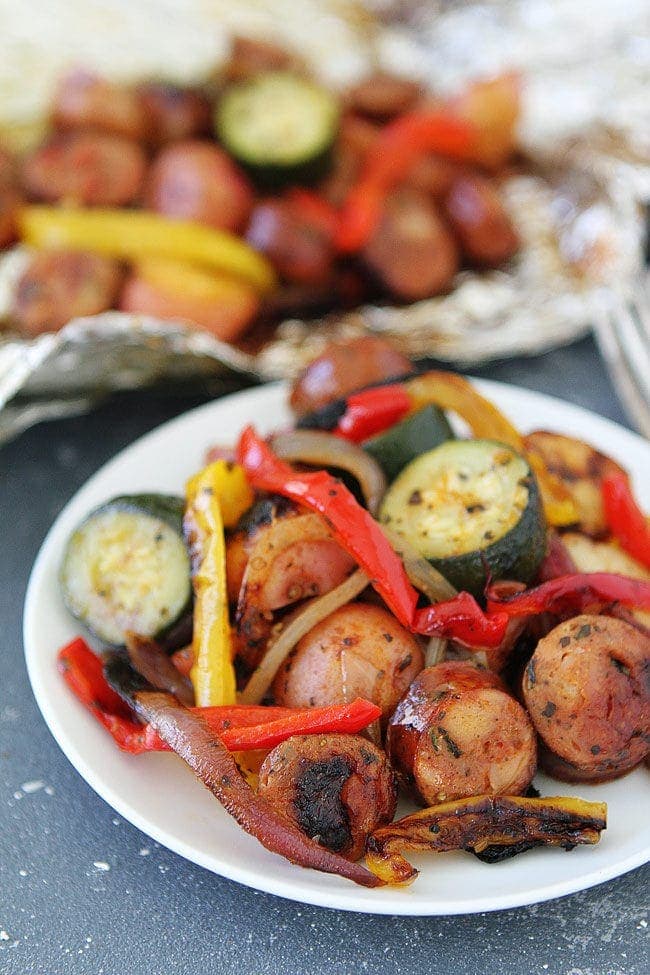 Grilled Sausage and Vegetable Foil Packets make a great summer dinner. They are easy to make and the clean up is a breeze. 