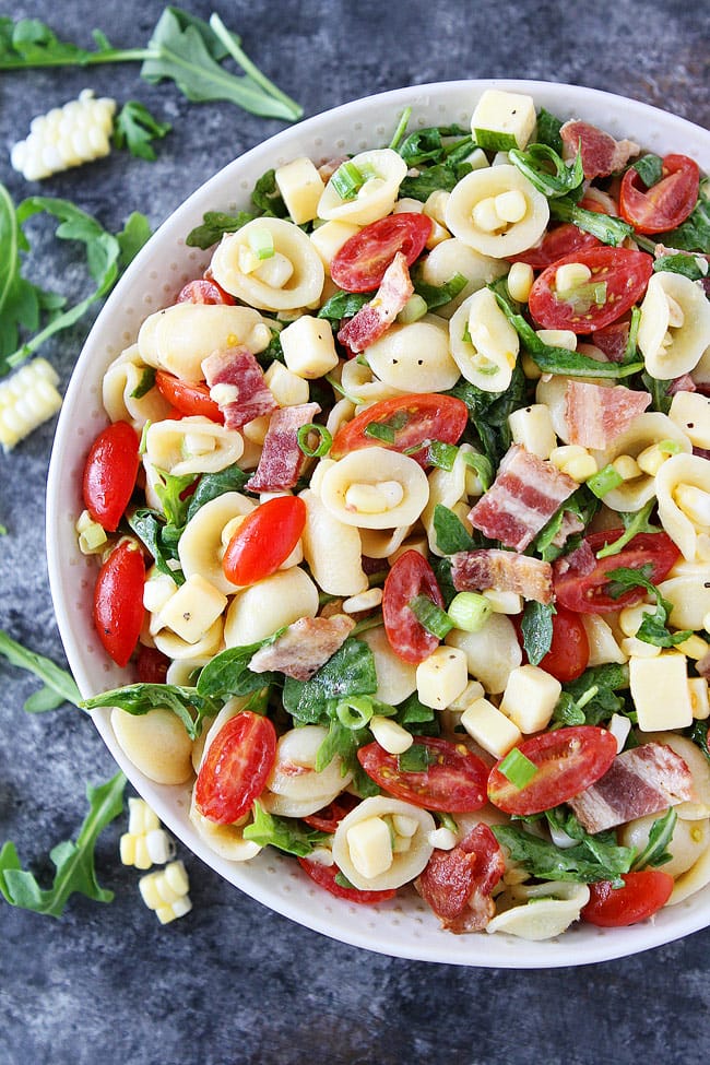 Bacon Corn Tomato Pasta Salad is the perfect summer pasta salad. Great for potlucks, picnics, and BBQ's. 