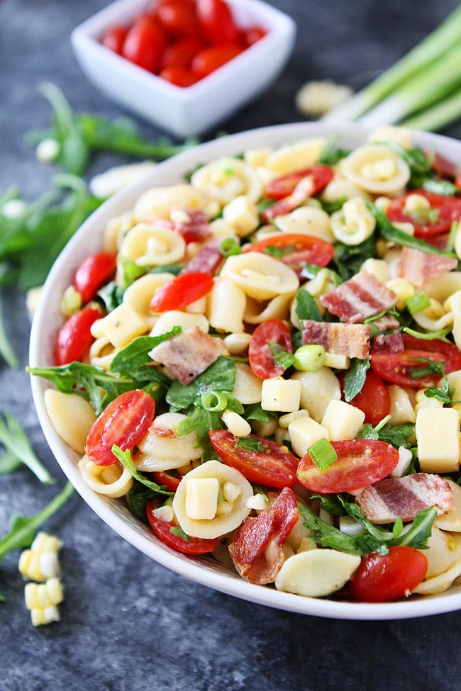 Bacon Pasta Salad with corn and tomatoes is a summer favorite! Everyone loves this easy pasta salad!