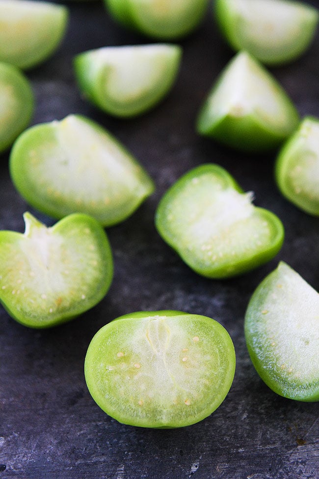 Tomatillos cut in half for tomatillo salsa