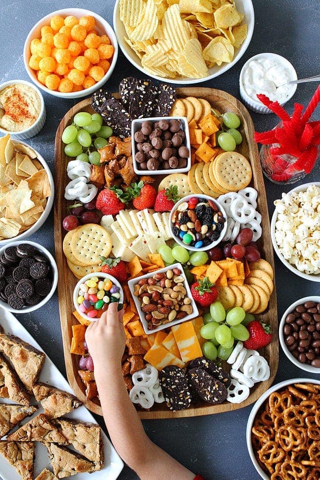 Make a Sweet and Salty Snack Board for your next party. The perfect snacks for easy entertaining!