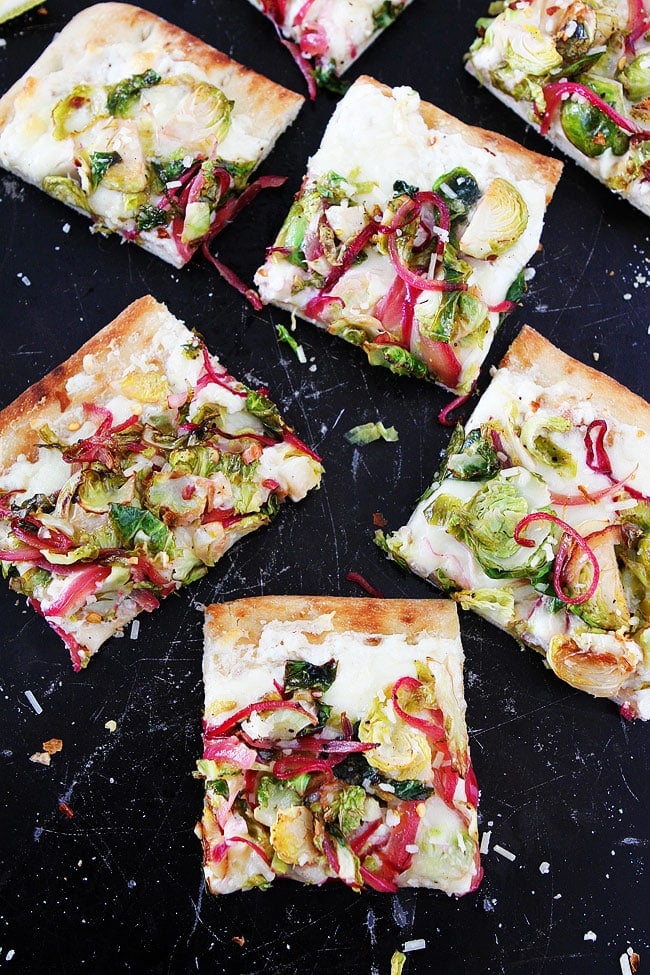 Brussels Sprouts Flatbread Pizza only takes 20 minutes to make! This vegetarian pizza makes a great quick and easy meal.