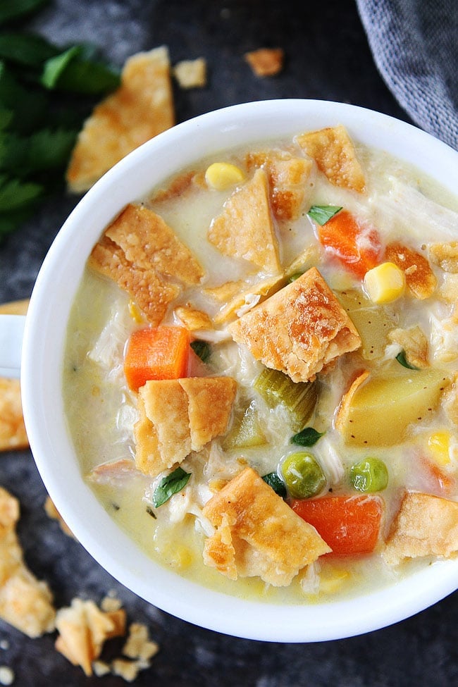 close up of chicken pot pie soup in bowl. 