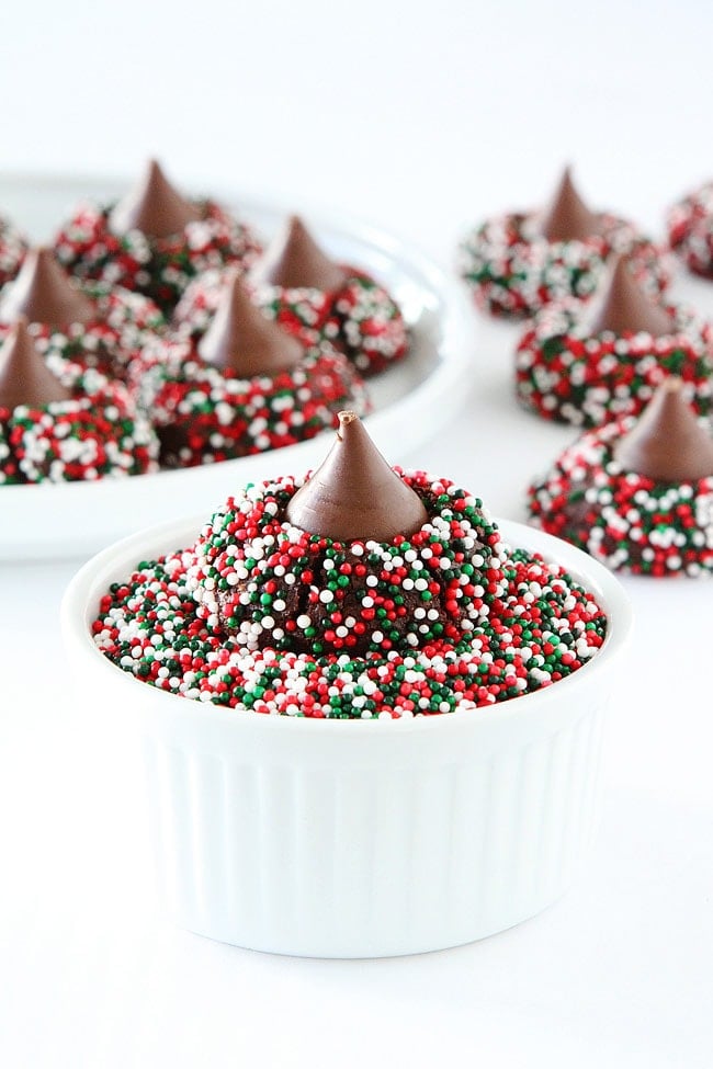 Chocolate Kiss Cookies are the perfect Christmas cookies and they are easy to make! #cookies #Christmascookies #chocolate #sprinkles #Hersheyskisses