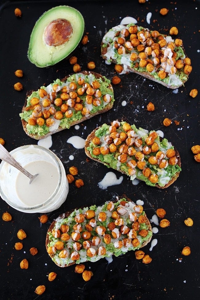 Roasted Chickpea Avocado Toast with a drizzle of lemon tahini dressing makes a great healthy breakfast, lunch, or snack! #healthyrecipe #vegan #vegetarian #avocadotoast #easyrecipe