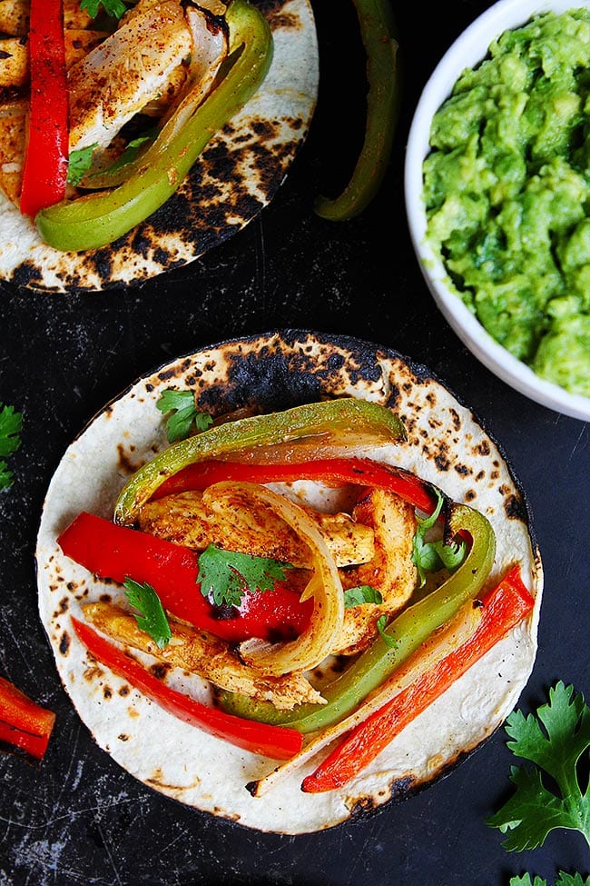 Sheet Pan Chicken Fajitas from Two Peas and Their Pod on foodiecrush.com