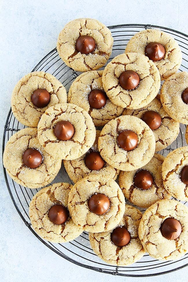 Peanut Butter Blossom cookies on wire cooling rack.