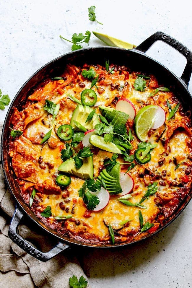 enchiladas in pan with homemade enchilada sauce