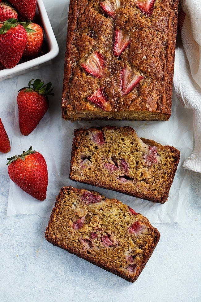 Strawberry Banana Bread made with fresh strawberries cut into slices.