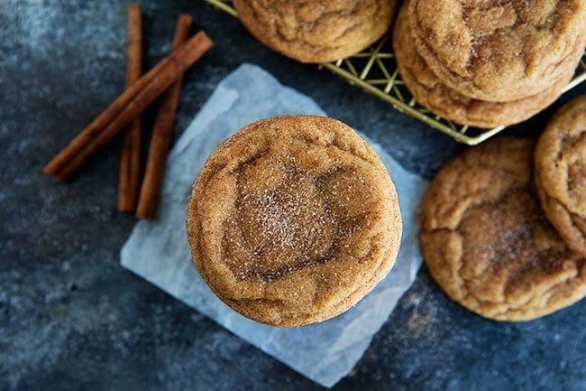 Pumpkin snickerdoodle cookies with cinnamon sticks.