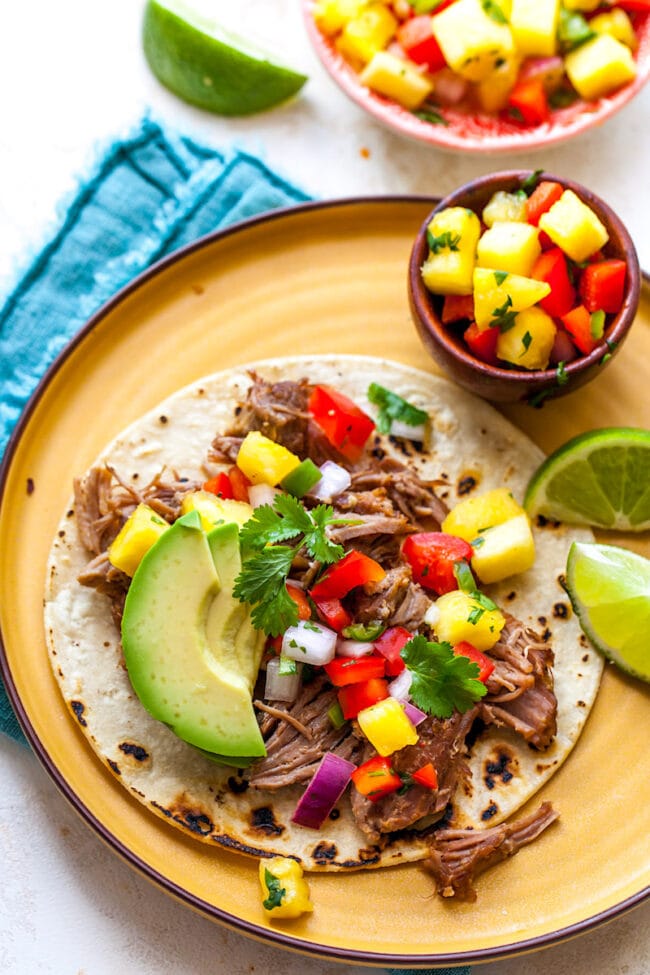Carnitas in tacos with pineapple salsa.