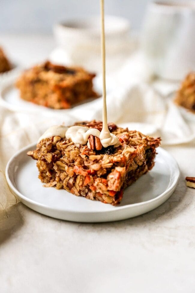 Carrot Cake Baked Oatmeal with drizzle of cream cheese glaze