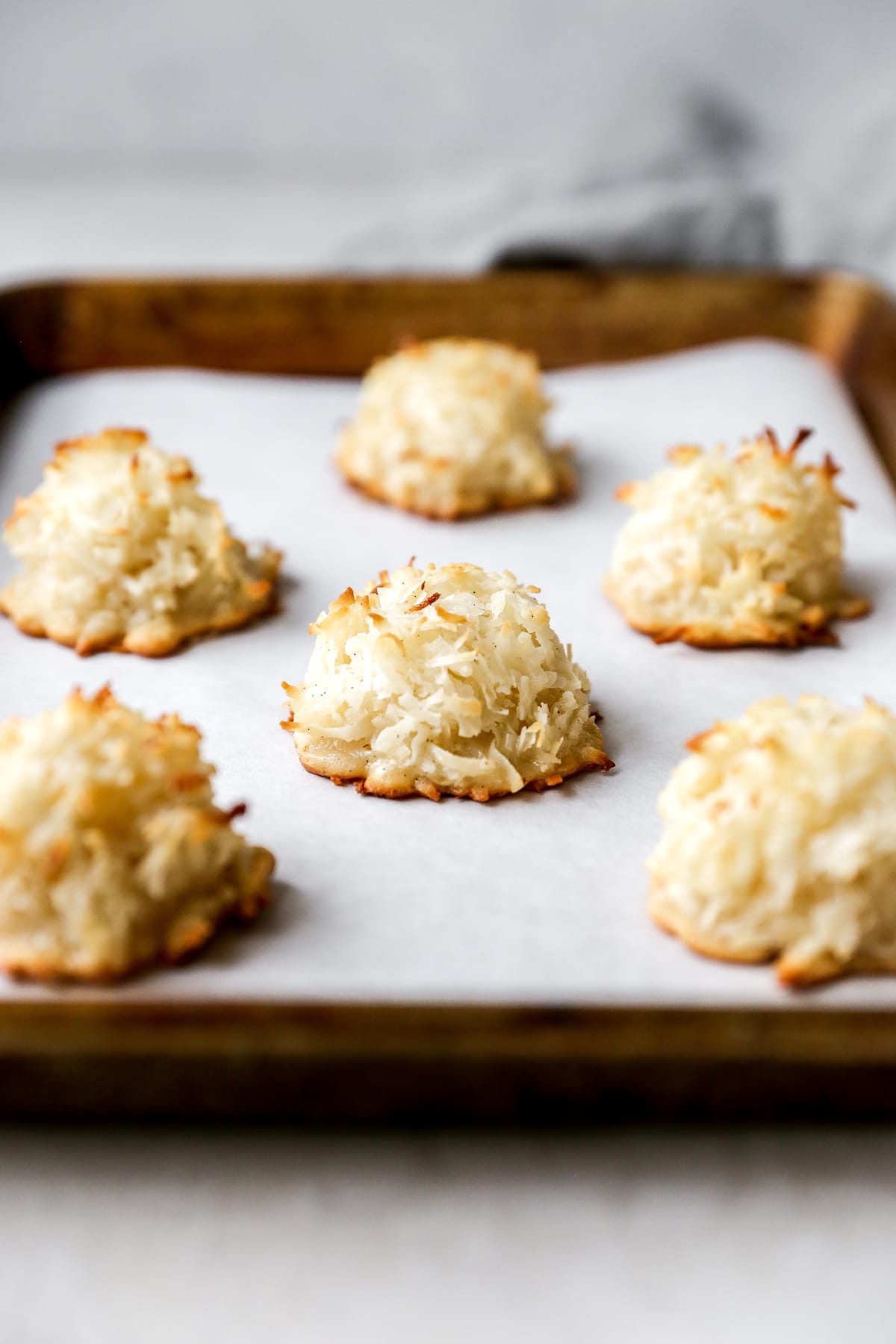 Coconut Macaroons on baking sheet with parchment paper.