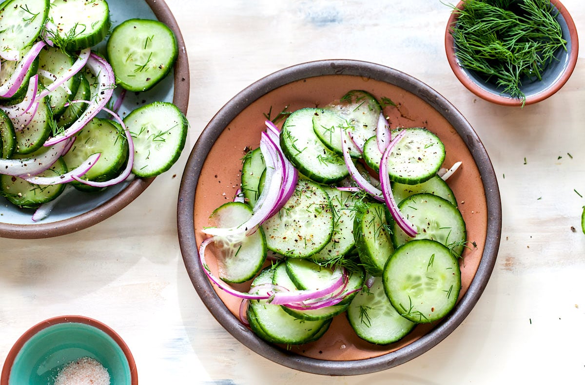 Easy cucumber salad on plates.