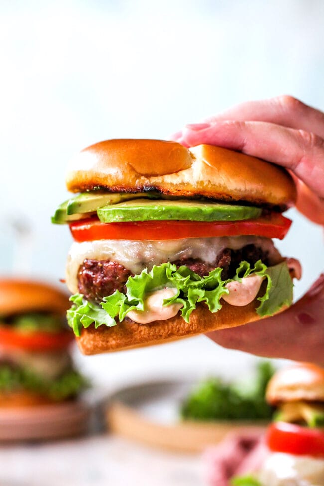 chipotle burger in hand