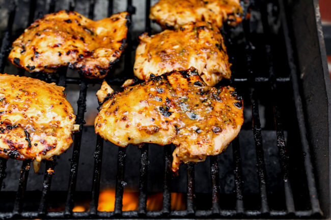 Honey Mustard Chicken cooking on grill